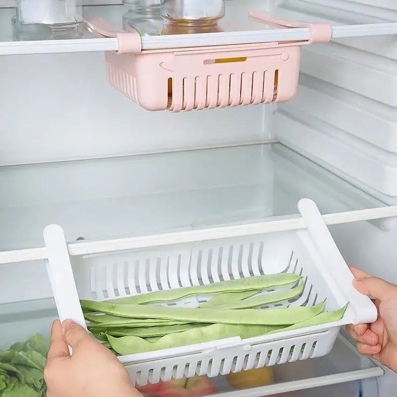 Maximize Your Fridge Space with This Expandable Storage Basket! 🍏🥦 #FridgeOrganization #HomeHacks